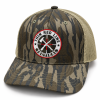 Angled view of the TRLT Mossy Oak Bottomland trucker hat with tan mesh back