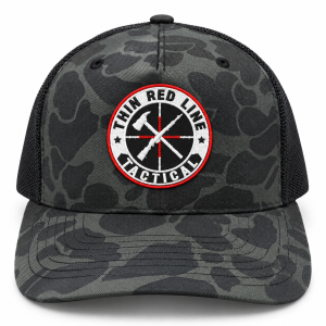 Front view of TRLT Richardson 112PFP Sable Duck and black trucker hat with embroidered logo